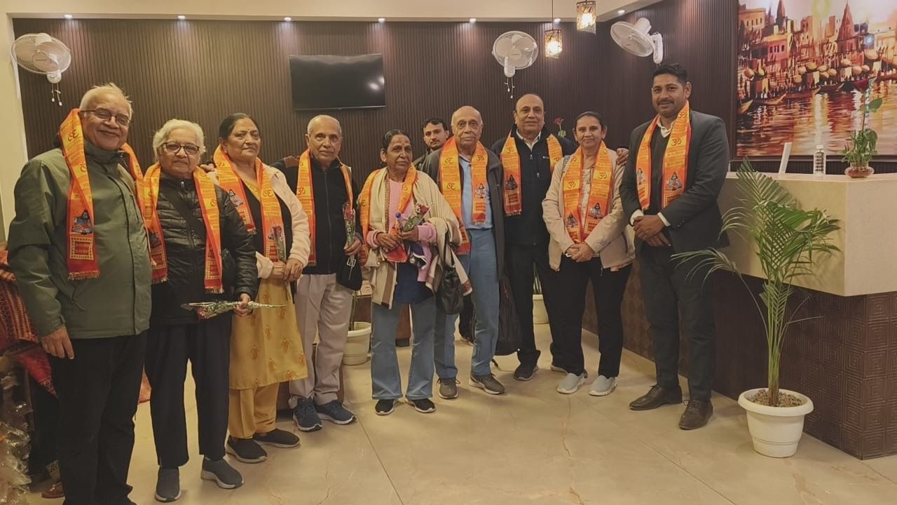 International pilgrims and NRIs enjoying Kashi Ganga Aarti boat tour
